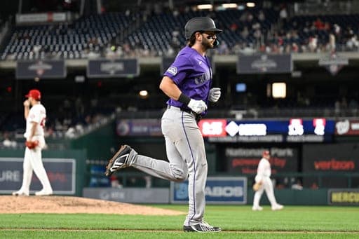 Colorado Rockies' Connor Norby runs to home plate after hitting a grand slam during the seventh inning of a baseball game against the Washington Nationals, Wednesday, Aug. 26, 2026, in Washington. (AP Photo/John McDonnell) (AP Photo/John McDonnell)