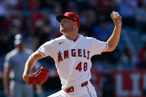 Detmers nearly perfect while striking out 14, Angels beat Rangers 2-1 on error in 9th for 1st sweep