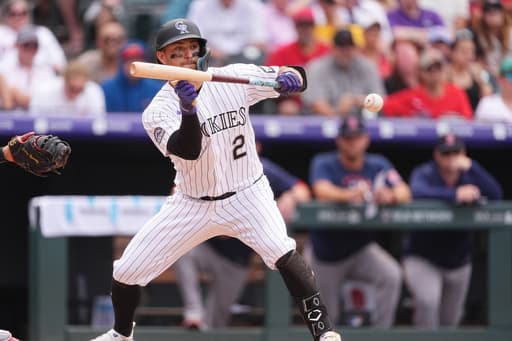 Freeman’s bunt drives in go-ahead run, Carrigg has 3 RBIs as Rockies rally past Red Sox