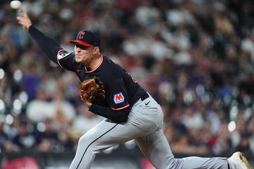 Cleveland Guardians relief pitcher Cade Smith works against the Colorado Rockies in the ninth inning of a baseball game Saturday, Aug. 22, 2026, in Denver. (AP Photo/David Zalubowski) (AP Photo/David Zalubowski)