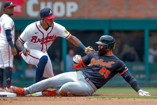 Tigers 2B Torres taking a break from swinging a bat as he works to return from left oblique strain