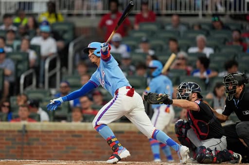 Dominic Smith homers and Braves back Chris Sale with 19 hits in 13-1 rout of Guardians