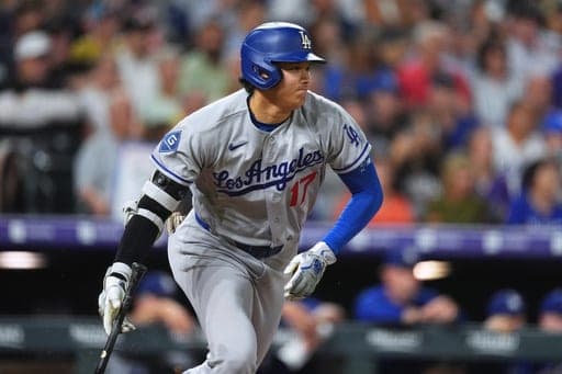 Los Angeles Dodgers' Shohei Ohtani grounds out against Colorado Rockies relief pitcher Zach Agnos in the eighth inning of a baseball game Tuesday, Aug. 18, 2026, in Denver. (AP Photo/David Zalubowski) (AP Photo/David Zalubowski)