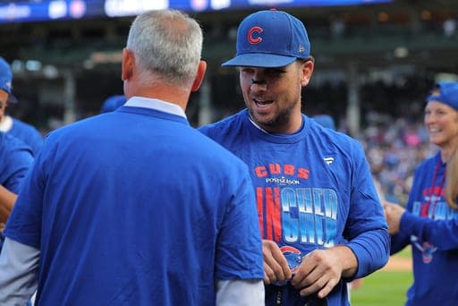 Chicago Cubs' Alex Bregman celebrates after clinching a National League wild-card spot following a baseball game against the Miami Marlins, Thursday, Sept. 24, 2026, in Chicago. (AP Photo/Melissa Tamez) (AP Photo/Melissa Tamez)