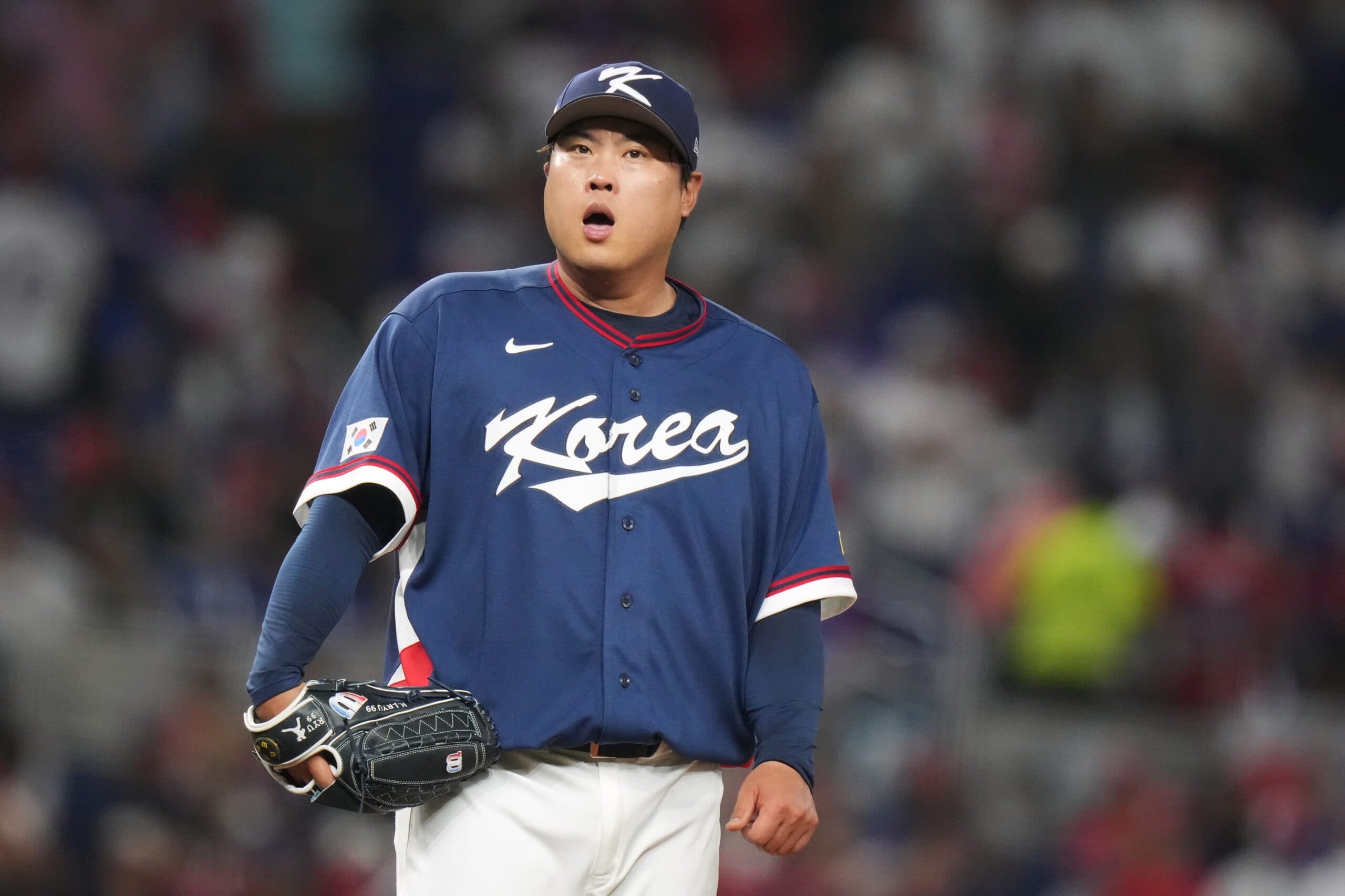 South Korea starting pitcher Ryu Hyun-jin reacts on the mound during the second inning of a World Baseball Classic quarterfinal game against the Dominican Republic, Friday, March 13, 2026, in Miami. (AP Photo/Lynne Sladky