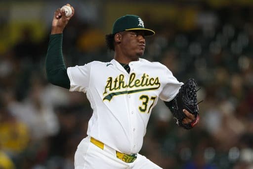 Athletics pitcher Elvis Alvarado throws to a Houston Astros batter during the ninth inning of a baseball game Thursday, Sept. 24, 2026, in West Sacramento, Calif. (AP Photo/Scott Marshall) (AP Photo/Scott Marshall)