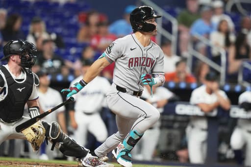 Carroll hits a grand slam as the Diamondbacks beat the Marlins 10-4