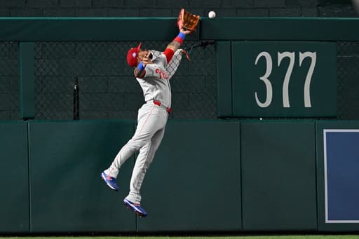 Phillies score 8 runs in the ninth inning and rally past the Nationals 14-9