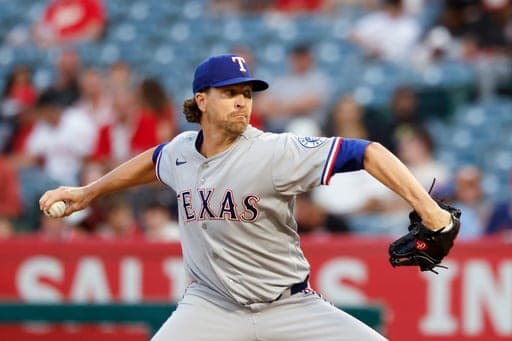 Texas Rangers starting pitcher Jacob Degrom (48) throws during the first inning of a baseball game against the Los Angeles Angels, Thursday, Aug. 13, 2026, in Anaheim, Calif. (AP Photo/Caroline Brehman) (AP Photo/Caroline Brehman)