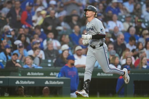 Stowers homers twice, Weathers strong in return to lead Marlins over Cubs 3-1