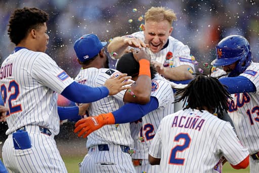 Mets rally past White Sox 2-1 on late sac flies by Soto and Lindor