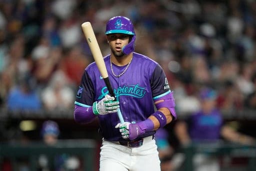 Arizona Diamondbacks' Lourdes Gurriel Jr. steps in to bat against the Texas Rangers during the fourth inning of a baseball game, Friday, Sept. 11, 2026, in Phoenix. (AP Photo/Ross D. Franklin) (AP Photo/Ross D. Franklin)