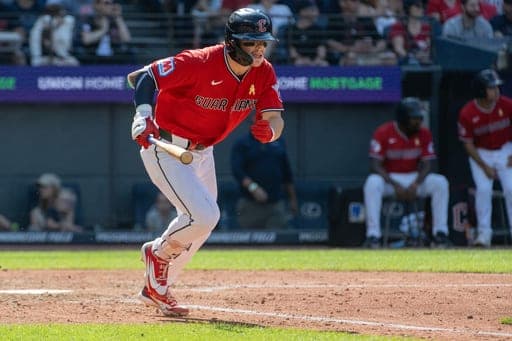 Cleveland Guardians' Travis Bazzana runs out an infield single off Detroit Tigers relief pitcher Drew Sommers during the eighth inning of a baseball game, Sunday, Sept. 6, 2026, in Cleveland. (AP Photo/Phil Long) (AP Photo/Phil Long)