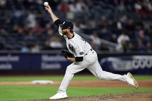 New York Yankees pitcher Paul Blackburn (58) throws during the eighth inning of a baseball game Tampa Bay Rays, Wednesday, Sept. 23, 2026, in New York. (AP Photo/Adam Hunger) (AP Photo/Adam Hunger)