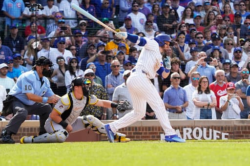 Happ hits a game-ending single in the 10th as the Cubs top the Pirates 3-2