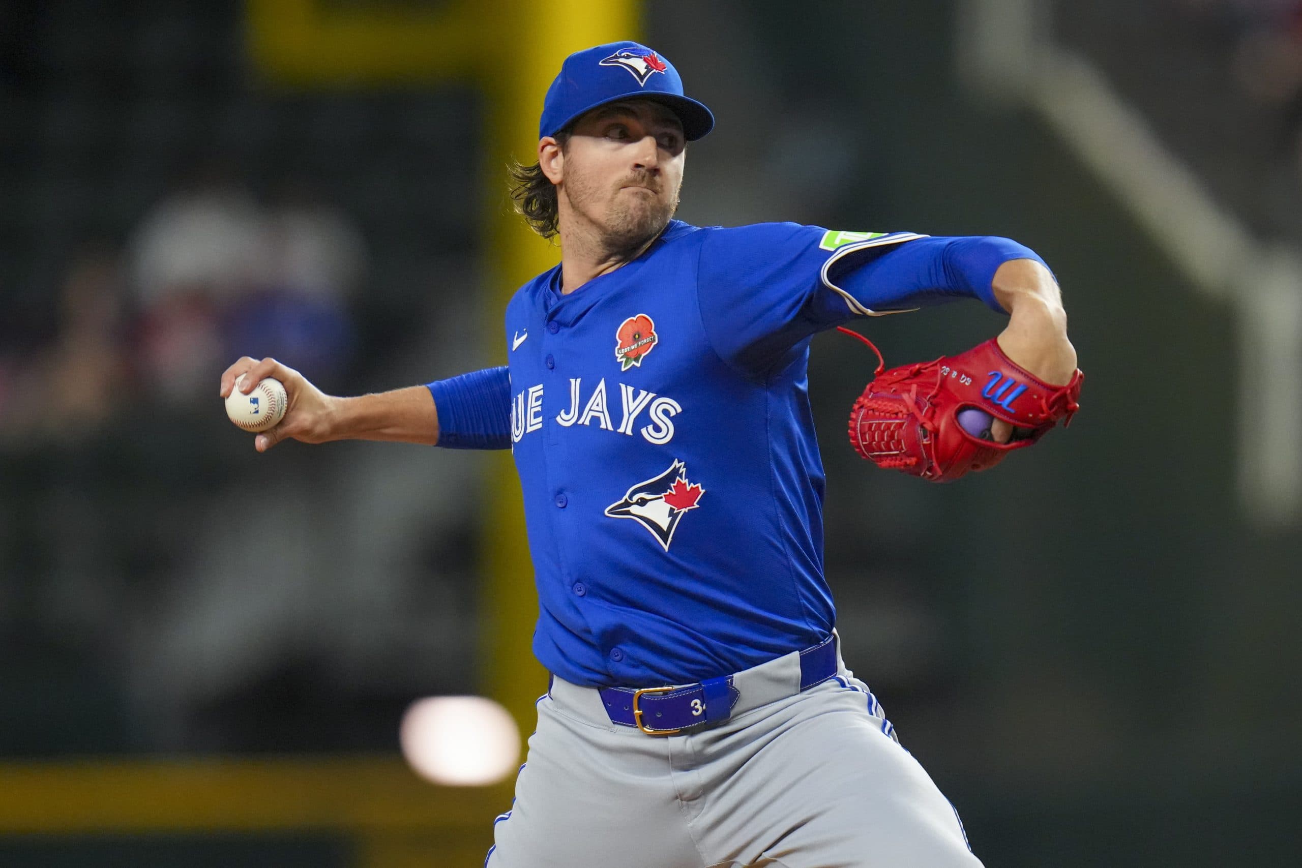 Gausman pitches 8 innings and Varsho homers as Blue Jays beat Rangers
