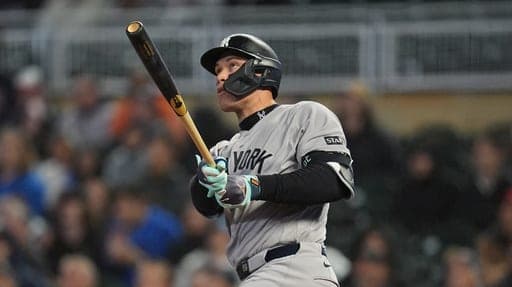 New York Yankees' Aaron Judge watches his 3-run home run during the eighth inning of a baseball game against the Minnesota Twins Monday, Sept. 14, 2026, in Minneapolis. (AP Photo/Abbie Parr) (AP Photo/Abbie Parr)