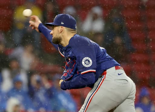 Rangers’ bats come alive with new coach Boone in dugout, beating the Red Sox 6-1