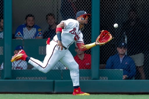 Torres has 3 hits and go-ahead sacrifice fly as Tigers rally to beat Braves 5-2 and avoid sweep