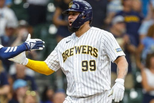 Milwaukee Brewers' Gary Sánchez reacts after his home run against the Texas Rangers during the seventh inning of a baseball game Sunday, Aug. 30, 2026, in Milwaukee. (AP Photo/Jeffrey Phelps) (AP Photo/Jeffrey Phelps)