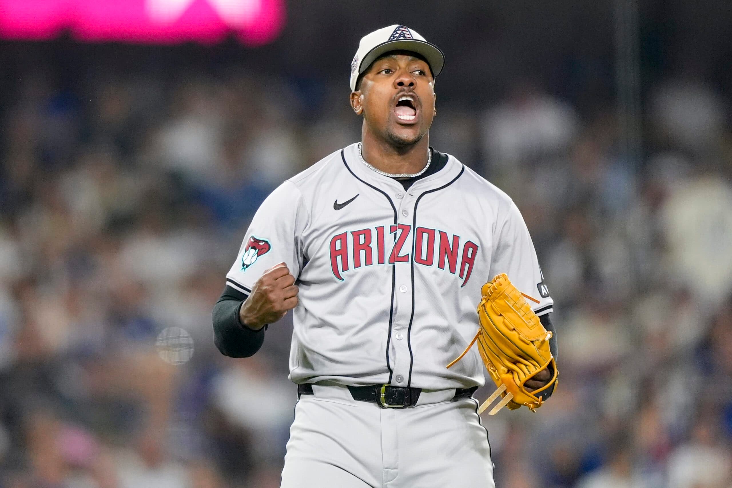 Arizona Diamondbacks relief pitcher Thyago Vieira reacts after striking out Los Angeles Dodgers pinch hitter Cavan Biggio for the final out a baseball game, Thursday, July 4, 2024, in Los Angeles. (AP Photo/Ryan Sun)
