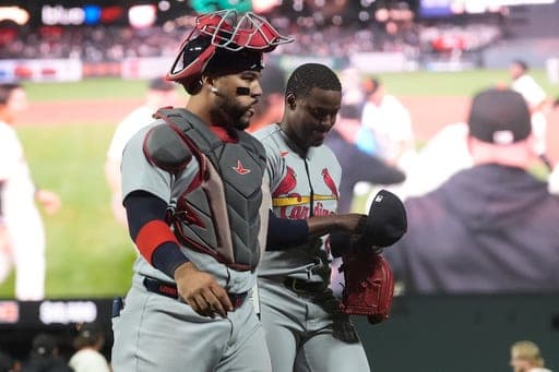 St. Louis Cardinals catcher Leo Bernal, left, and pitcher George Soriano walk off the field after a baseball game against the San Francisco Giants, Monday, Sept. 7, 2026, in San Francisco. (AP Photo/Jeff Chiu) (AP Photo/Jeff Chiu)
