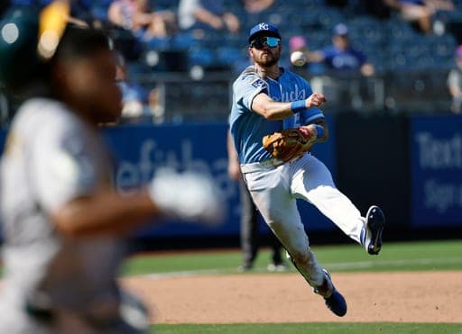Kansas City Royals third baseman Nick Loftin throws out Athletics' Darell Hernaiz after fielding a ground ball to end the eighth inning of a baseball game in Kansas City, Mo., Thursday, Aug. 20, 2026. (AP Photo/Colin E. Braley) (AP Photo/Colin E. Braley)