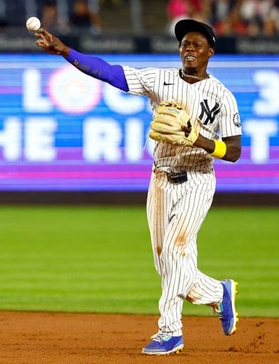 New York Yankees second baseman Jazz Chisholm Jr. throws out Colorado Rockies Cole Carrigg during the ninth inning of a baseball game, Tuesday, Sept. 8, 2026, in New York. (AP Photo/Noah K. Murray) (AP Photo/Noah K. Murray)