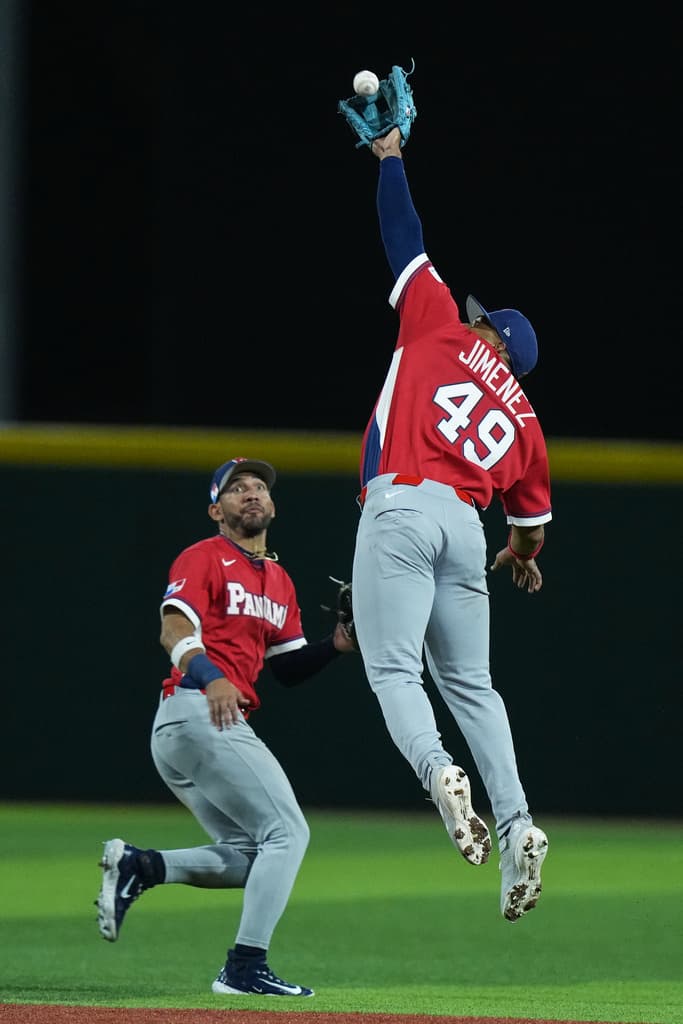 Panama infielder Leo Jimenez catches a fly ball during a World Baseball Classic game against Canada in San Juan on March 8, 2026.