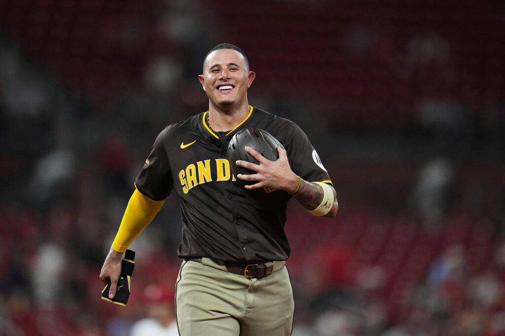 San Diego Padres' Manny Machado smiles during a pitching change in the sixth inning of a baseball game against the St. Louis Cardinals Thursday, July 24, 2025, in St. Louis. (AP Photo/Jeff Roberson)