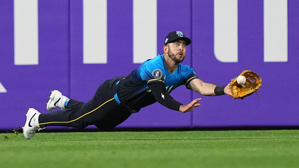 Phillies left fielder Otto Kemp catches a line drive hit by Ronald Acuña Jr.