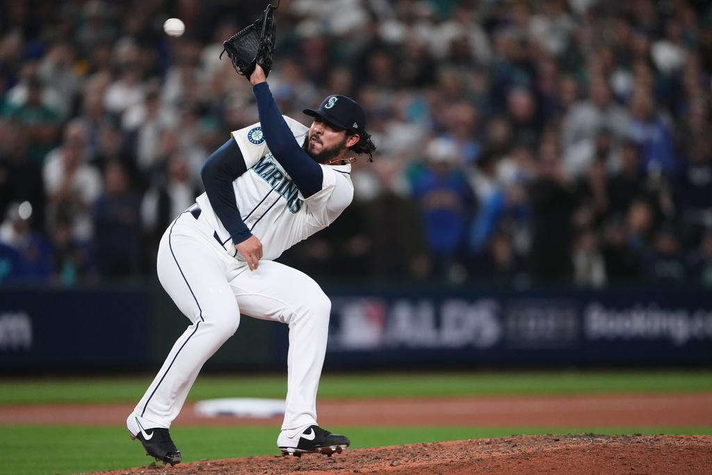 Seattle Mariners closer Andrés Muñoz fields a line drive during the ninth inning against the Detroit Tigers in Game 1 of the 2025 American League Division Series.
