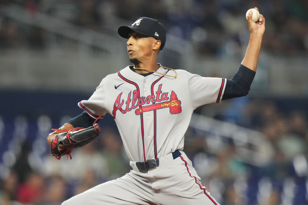 Braves left-hander Ray Kerr delivers a pitch against the Marlins.