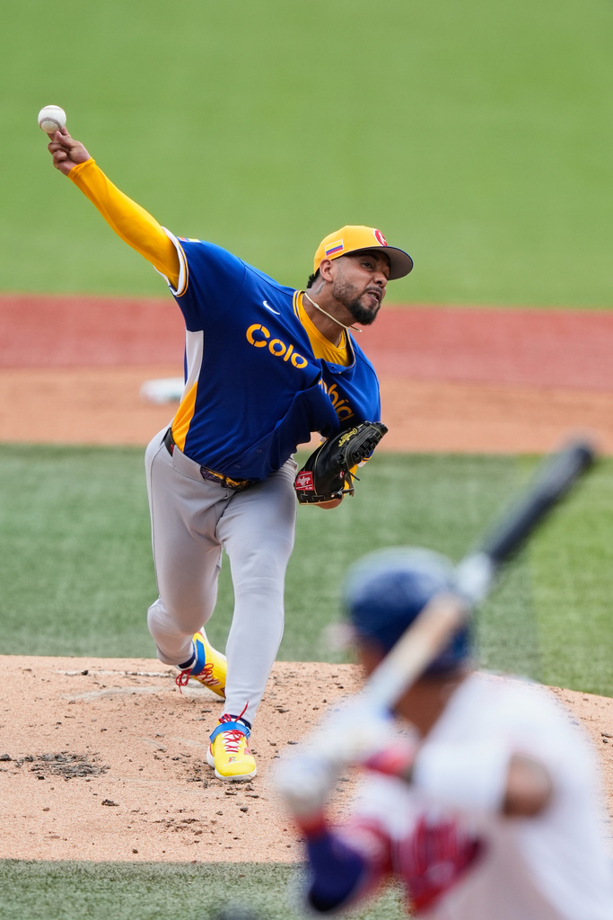 Colombia's pitcher Luis Patino pitches in the first inning against Cuba during a World Baseball Classic 